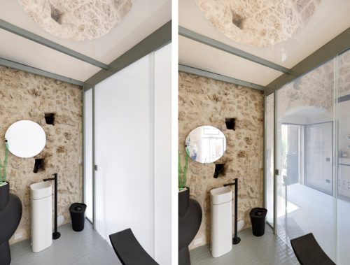Interno del bagno con vetro oscurante, acceso e spento